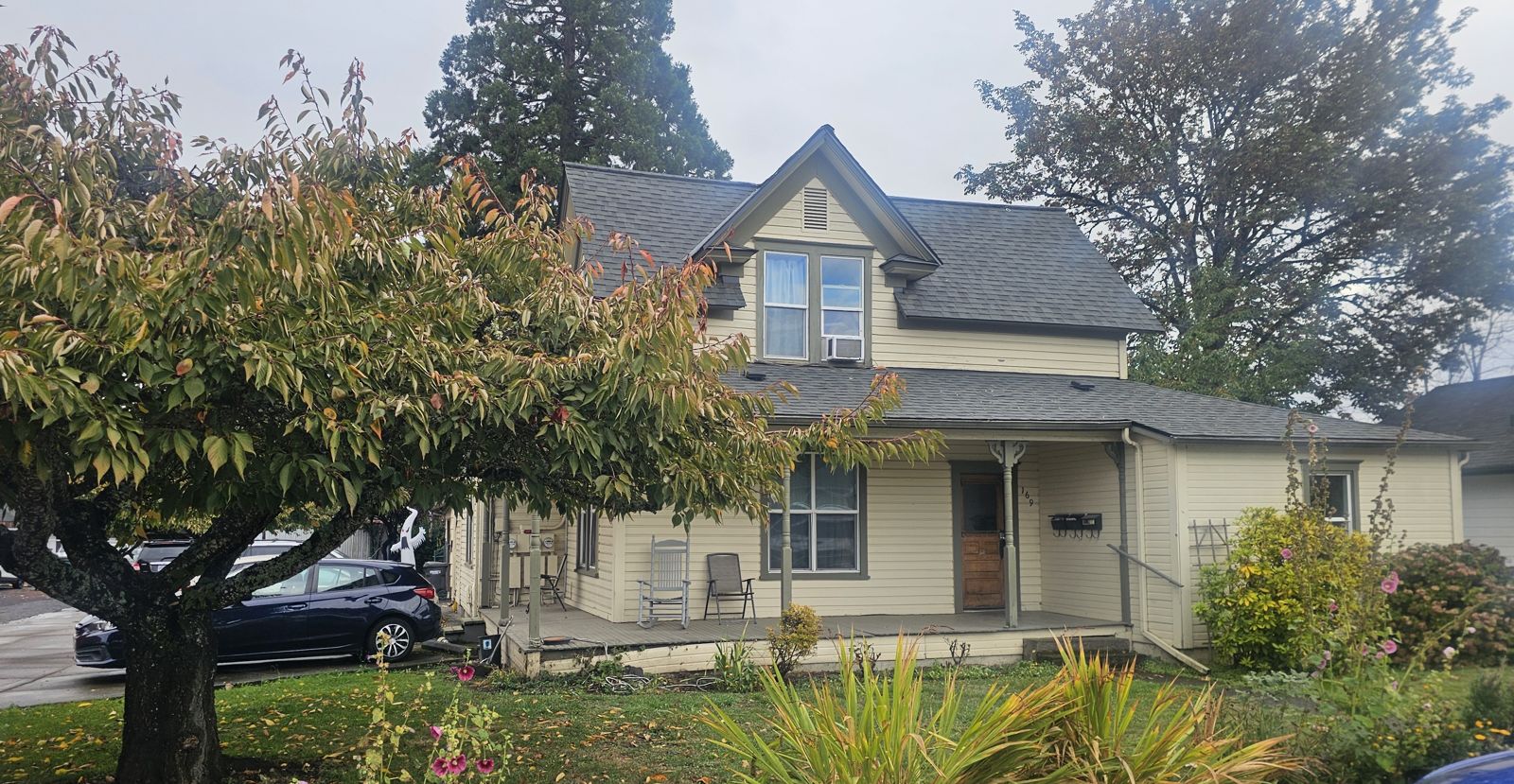 Front of the Knox St S property with covered porch, downtown Monmouth